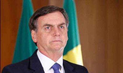 'No tomo decises sozinho. Ouo qualquer ministro, at Damares', diz Bolsonaro