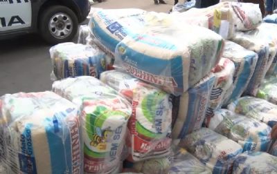 Com ajuda do Governo, dona de aougue distribuiu 2,7 mil cestas bsicas