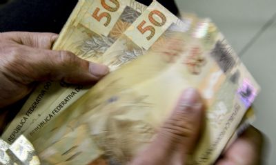 Caixa paga Bolsa Famlia a beneficirios de NIS de final 7