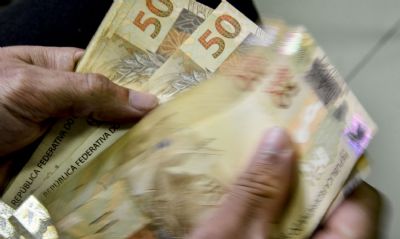 Caixa paga novo Bolsa Famlia a beneficirios com NIS de final 2
